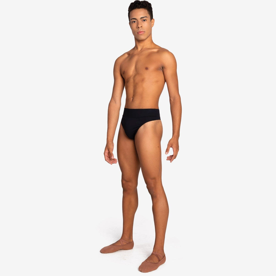 Man wearing a black swimsuit on a white background