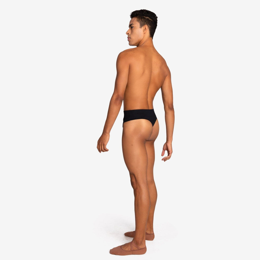 Man wearing a black underwear on a white background