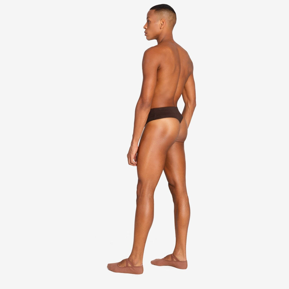 Man wearing a brown underwear on a white background