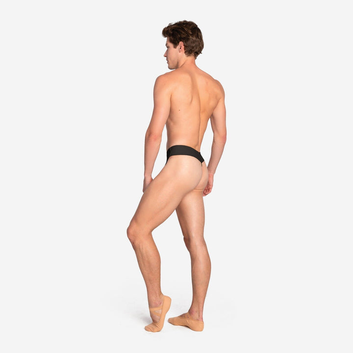 Man wearing a black men's underwear on a white background