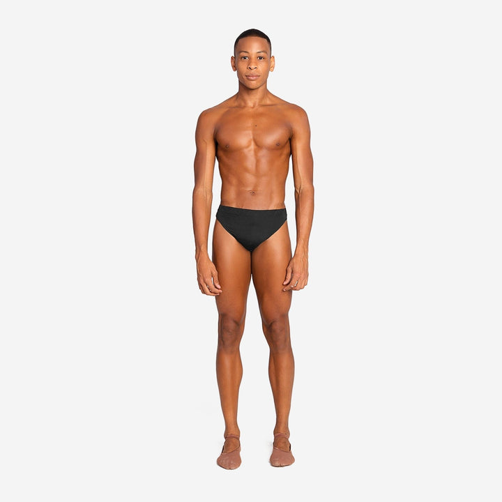 Man wearing a black swimsuit on a white background