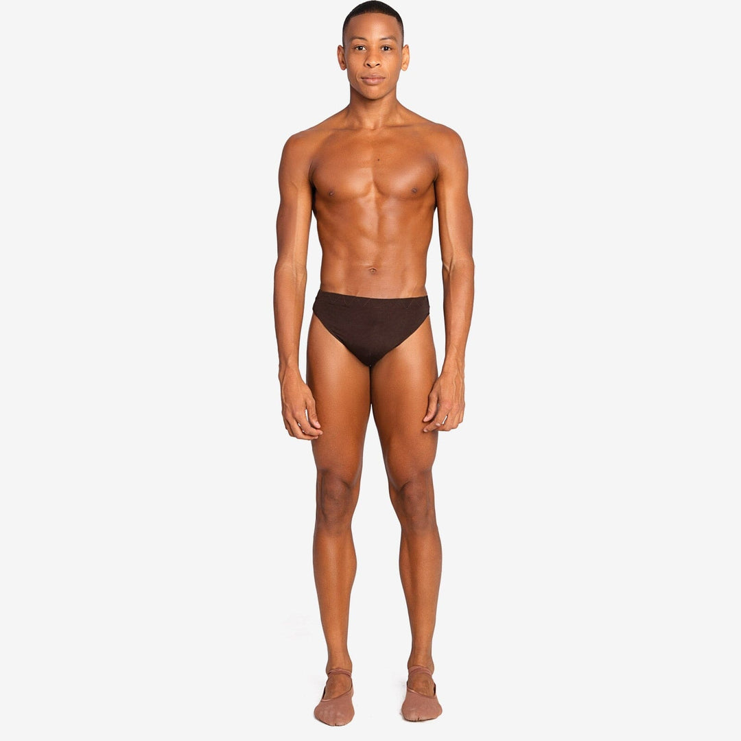 Man wearing a brown swimsuit on a white background