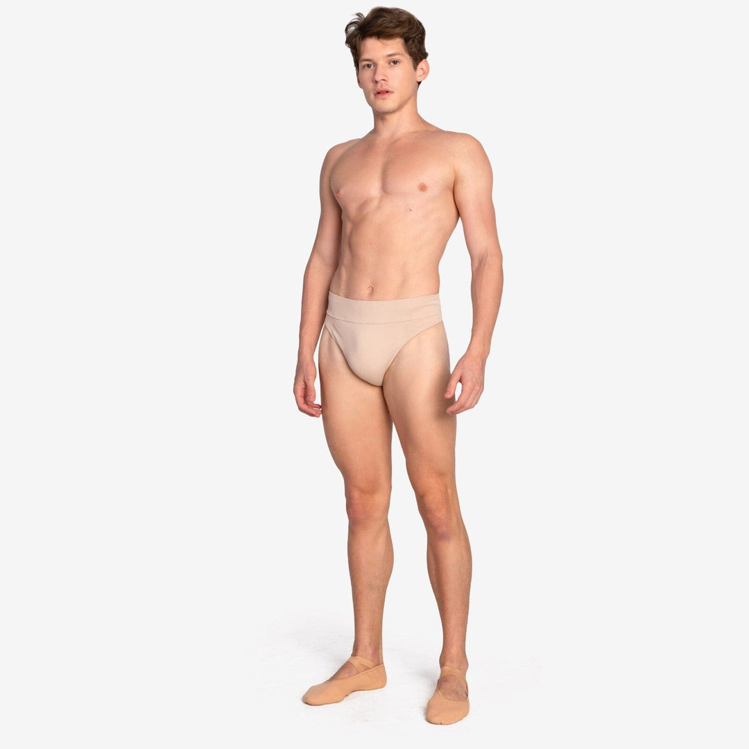 Man wearing beige underwear on a white background