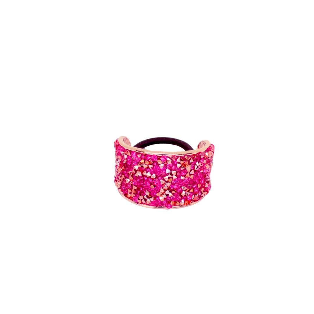 Pink glittery headband on a white background