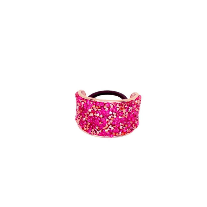 Pink glittery headband on a white background