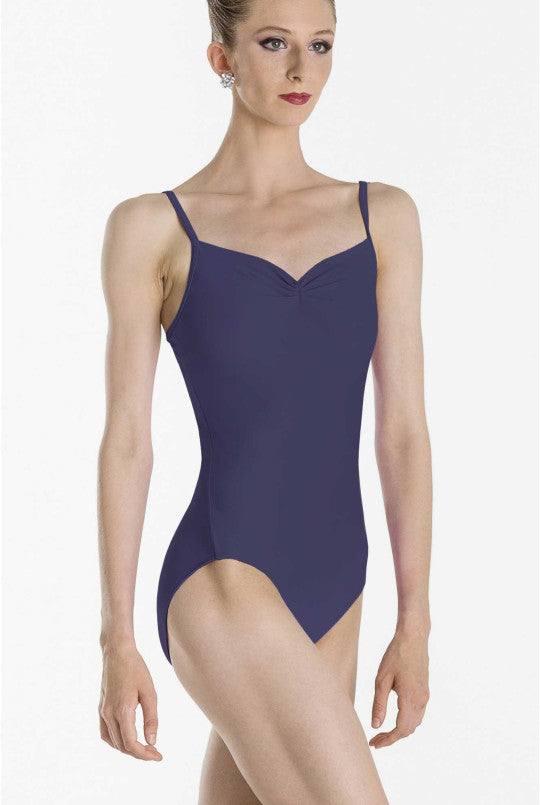 Navy leotard worn by a model on a white background