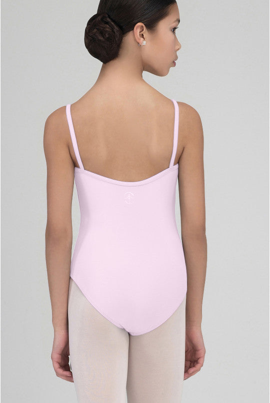 Person wearing a light pink leotard on a plain background