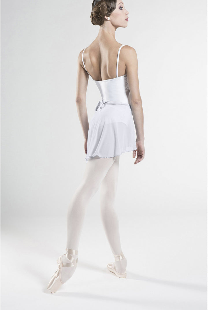 Ballerina in a white outfit with a backless design on a white background