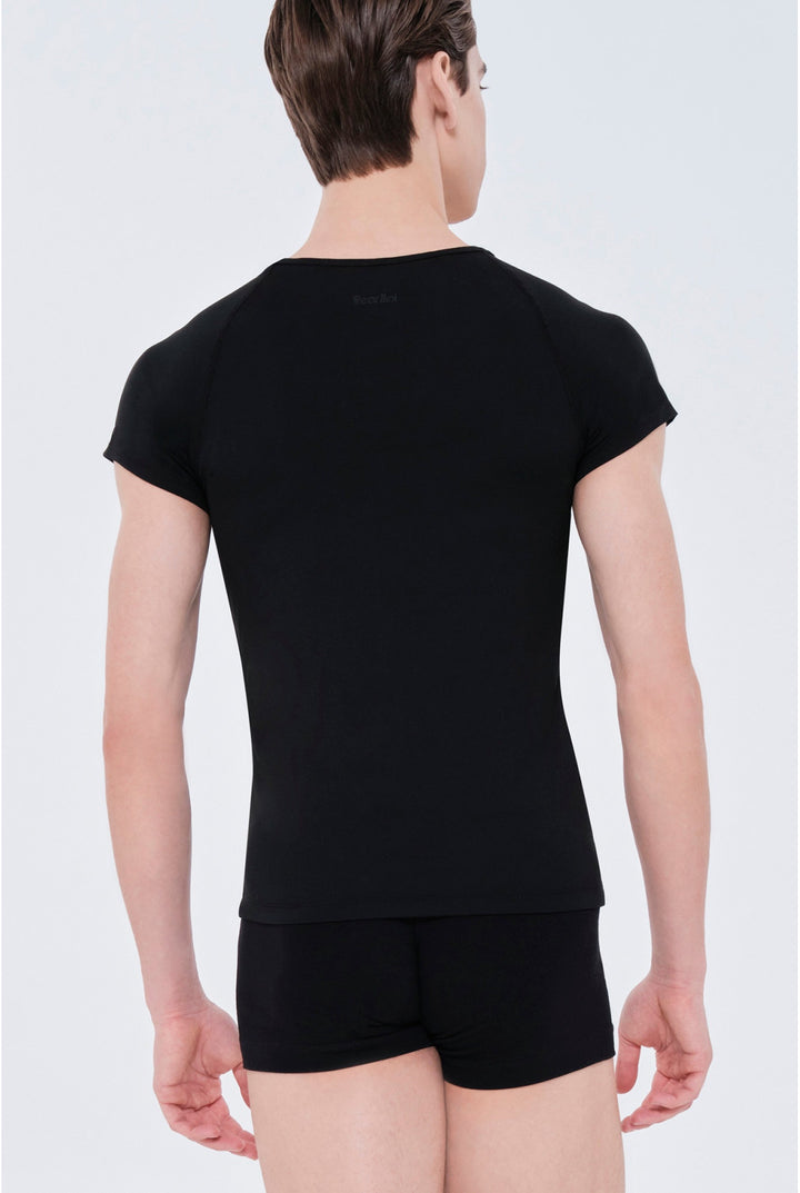Person wearing a black t-shirt and shorts on a white background