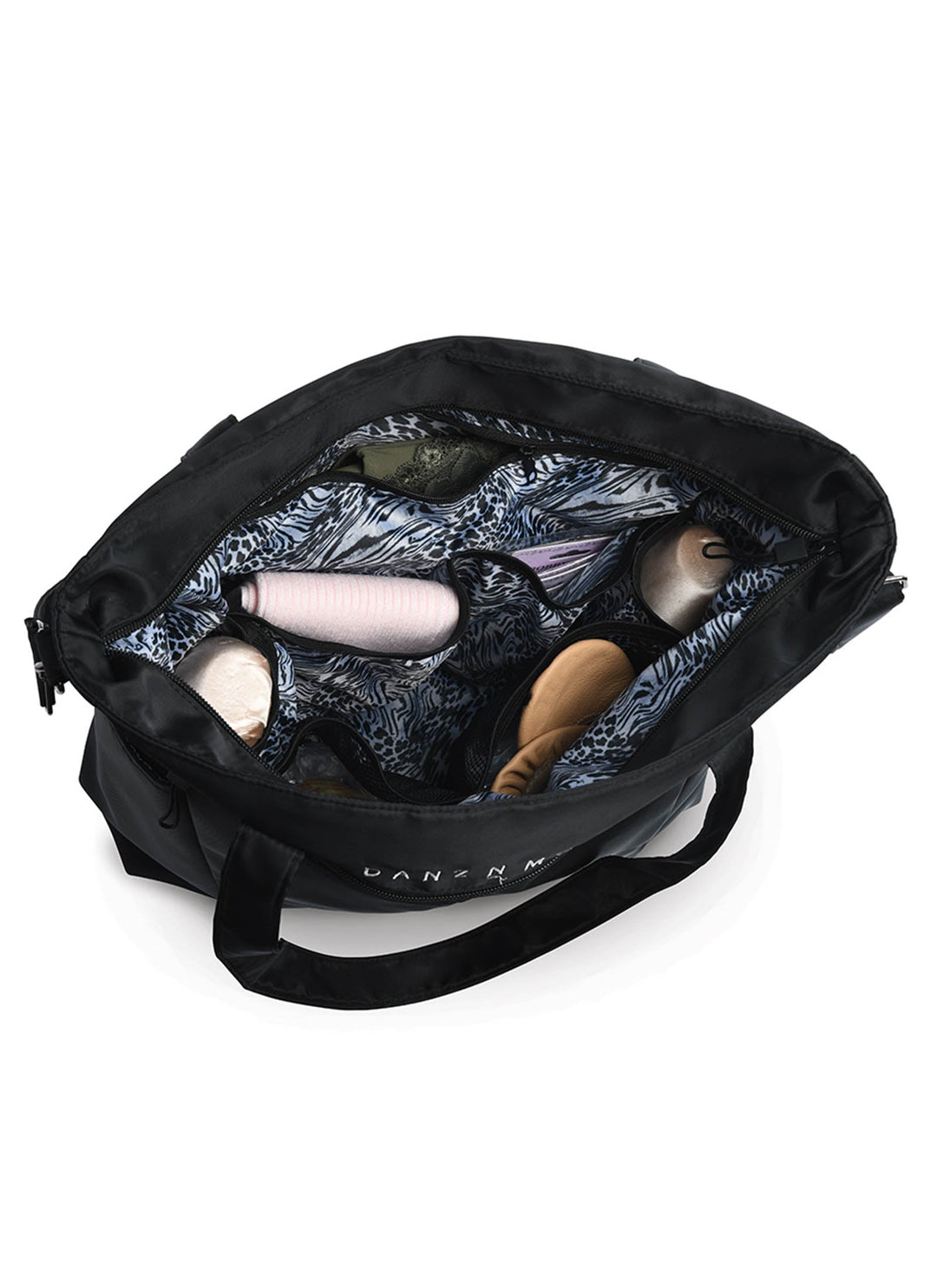 Black makeup bag with cosmetic items on a white background