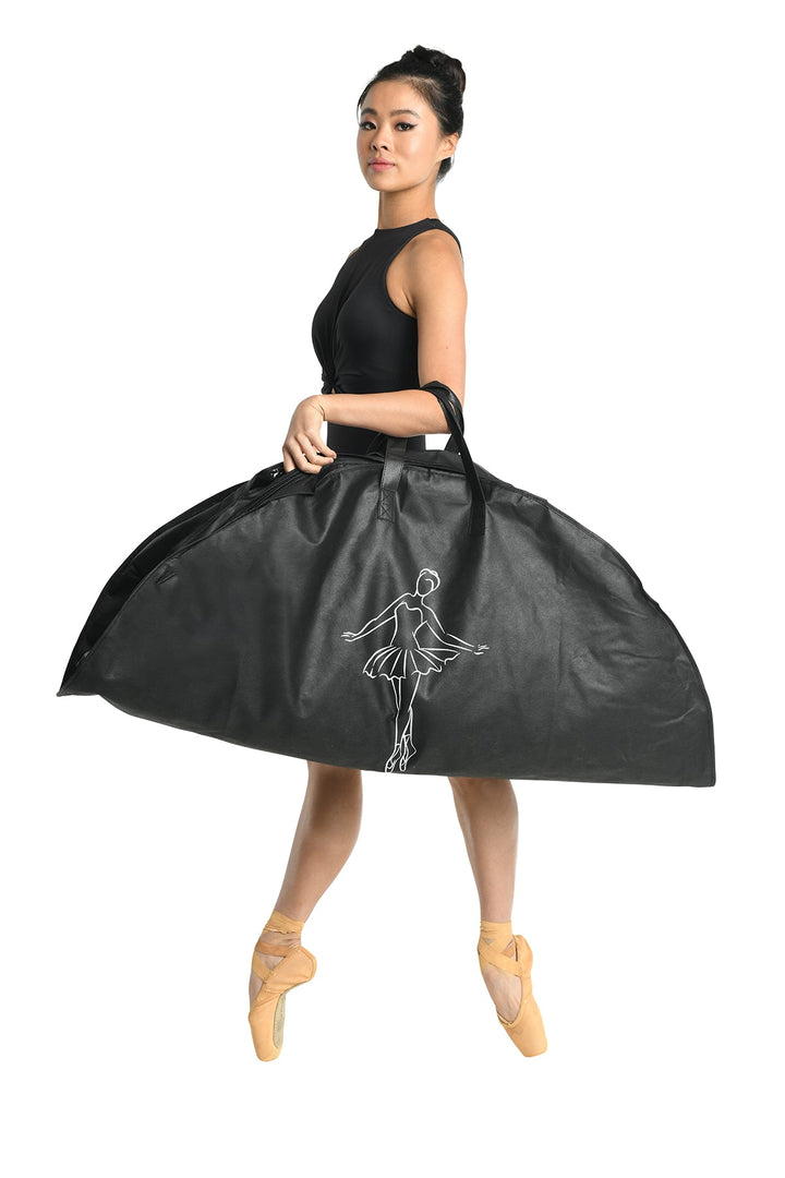 Person holding a black dance bag with a ballerina design on a white background