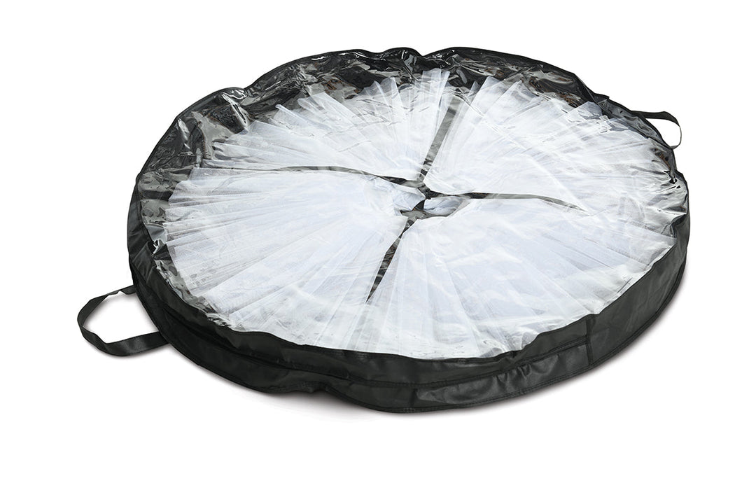 Black carrying bag with white tutu inside on a white background