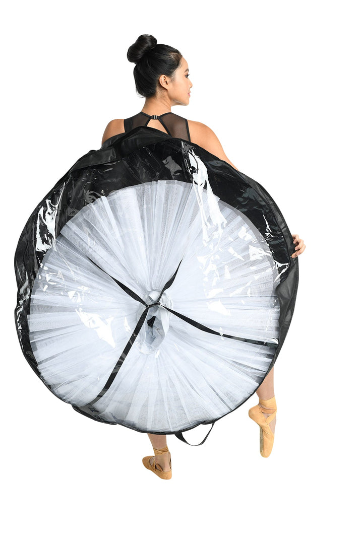Person holding a large white hoop with black accents on a white background