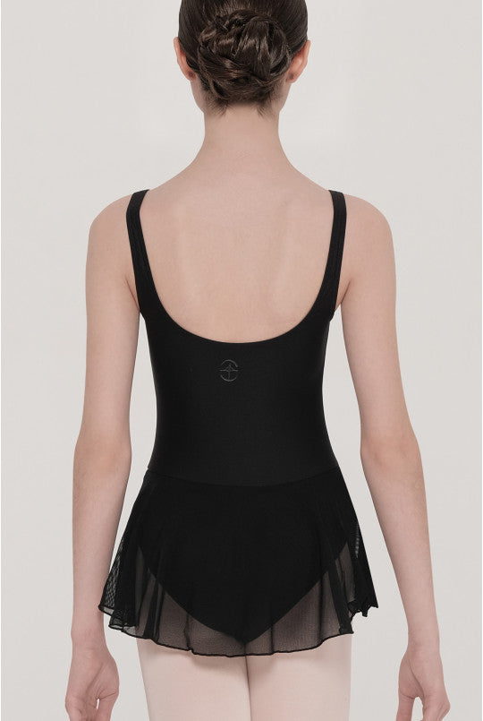 Black dance leotard with sheer overlay worn by a model on a plain background