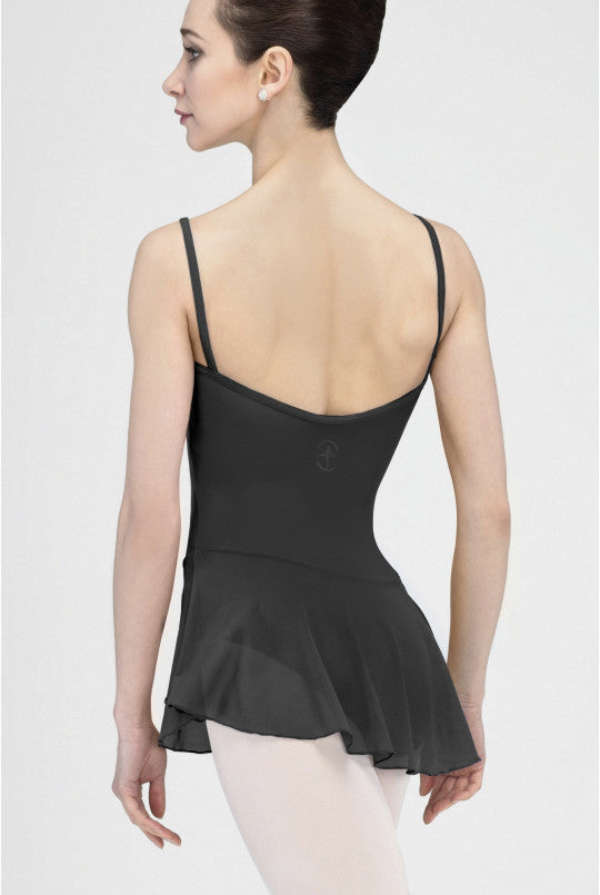 Ballerina wearing a black leotard with a skirt on a white background