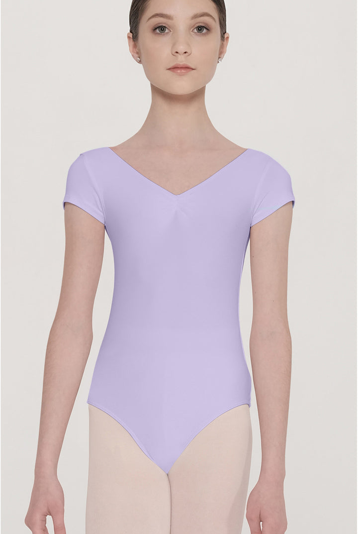 Person wearing a light purple leotard on a plain background