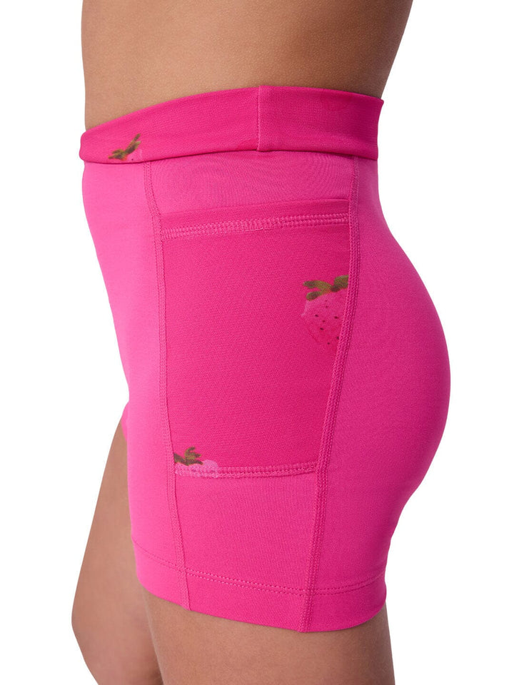 Pink athletic shorts with a brand logo on a white background