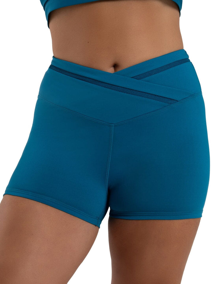 Blue athletic shorts worn by a person on a white background