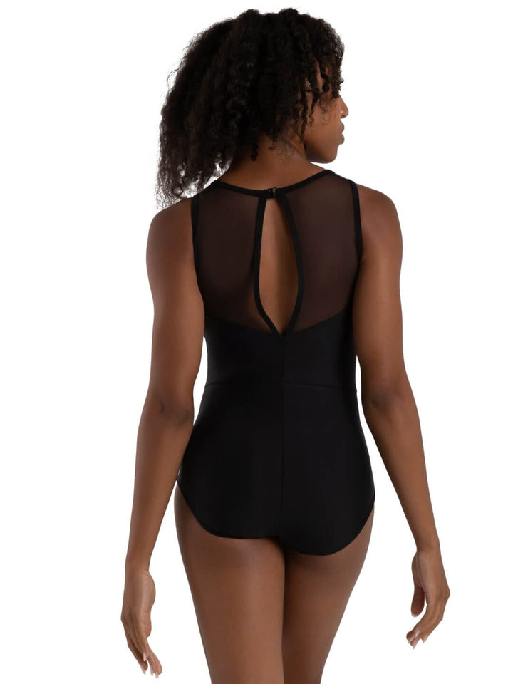 Black swimsuit with open back worn by a model on a white background