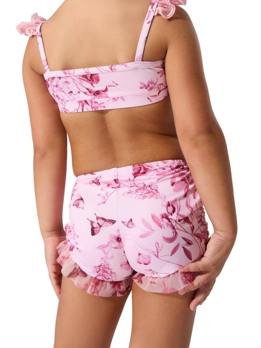 Pink floral bikini set on a white background