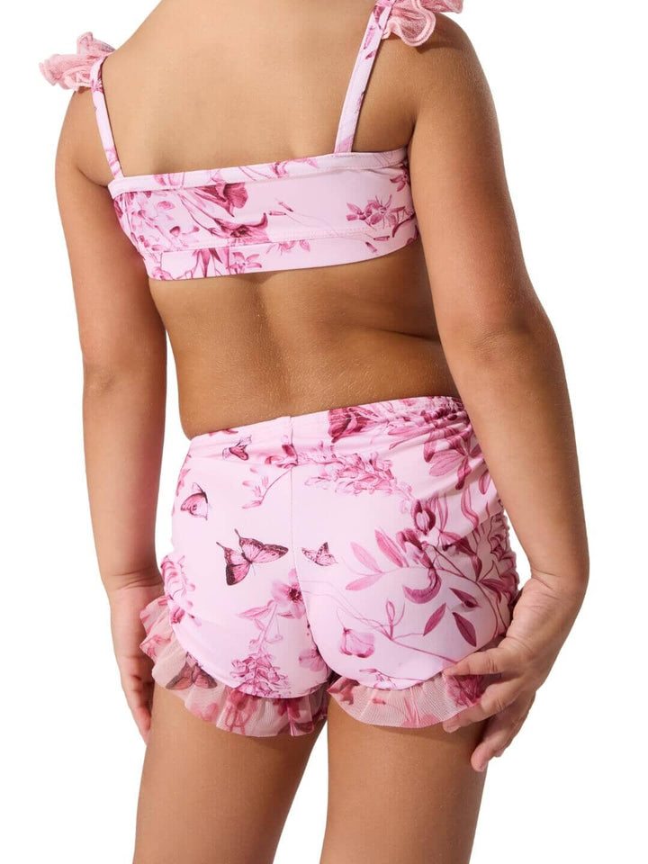 Pink floral bikini set on a white background