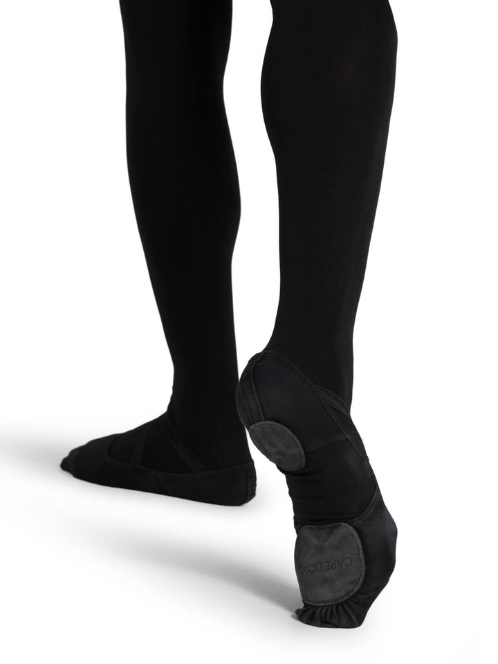 Black tights with footies on a white background