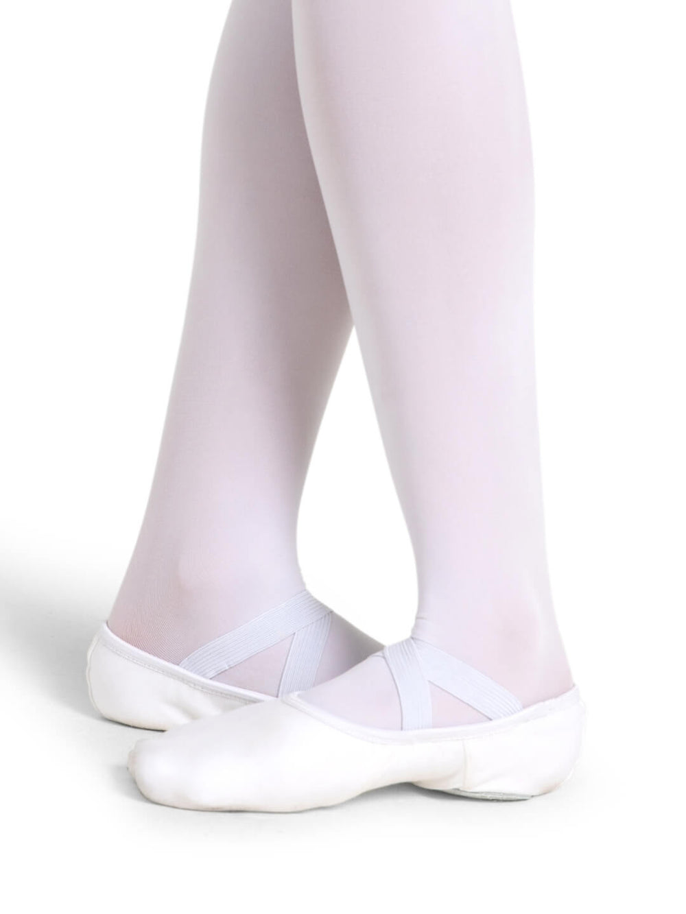 White ballet shoes and tights on a white background