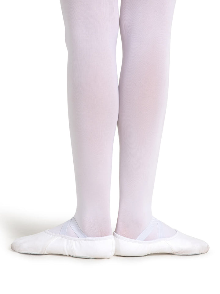 White tights and ballet shoes on a white background