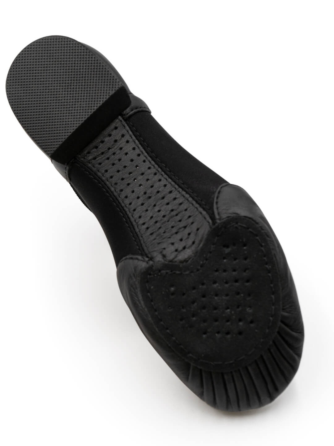 A black flat shoe shown from a top-down angle, featuring a textured black sole, perforated leather upper, and a heart-shaped black rubber toe cap on a white background.