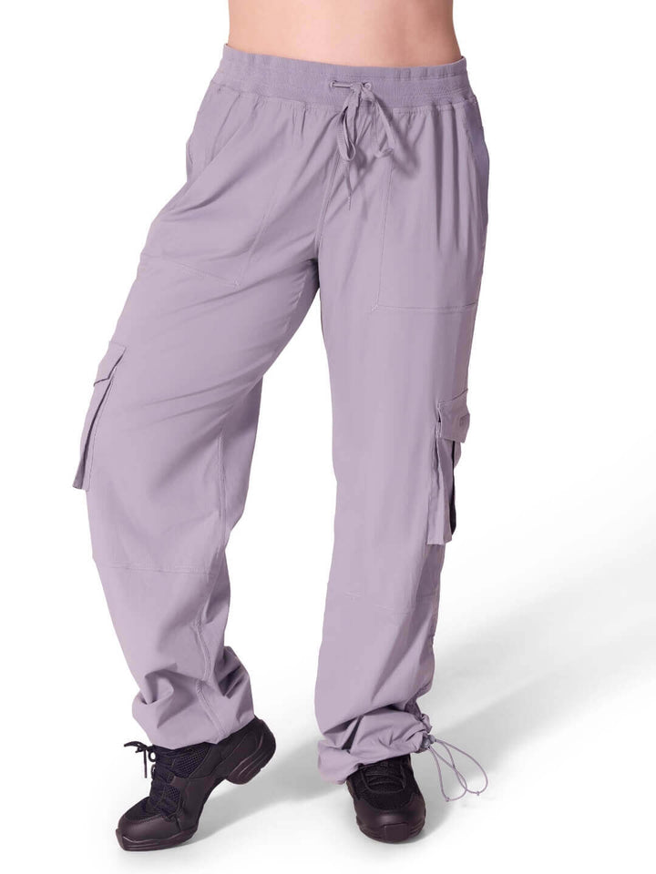Purple cargo pants on a white background