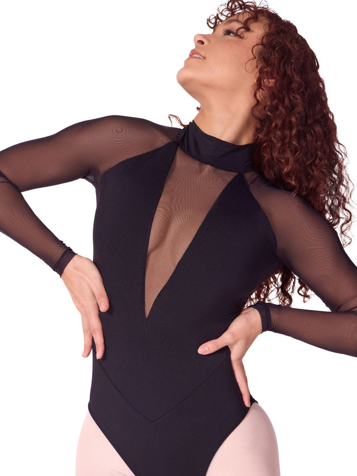 Person wearing a black sheer bodysuit on a white background