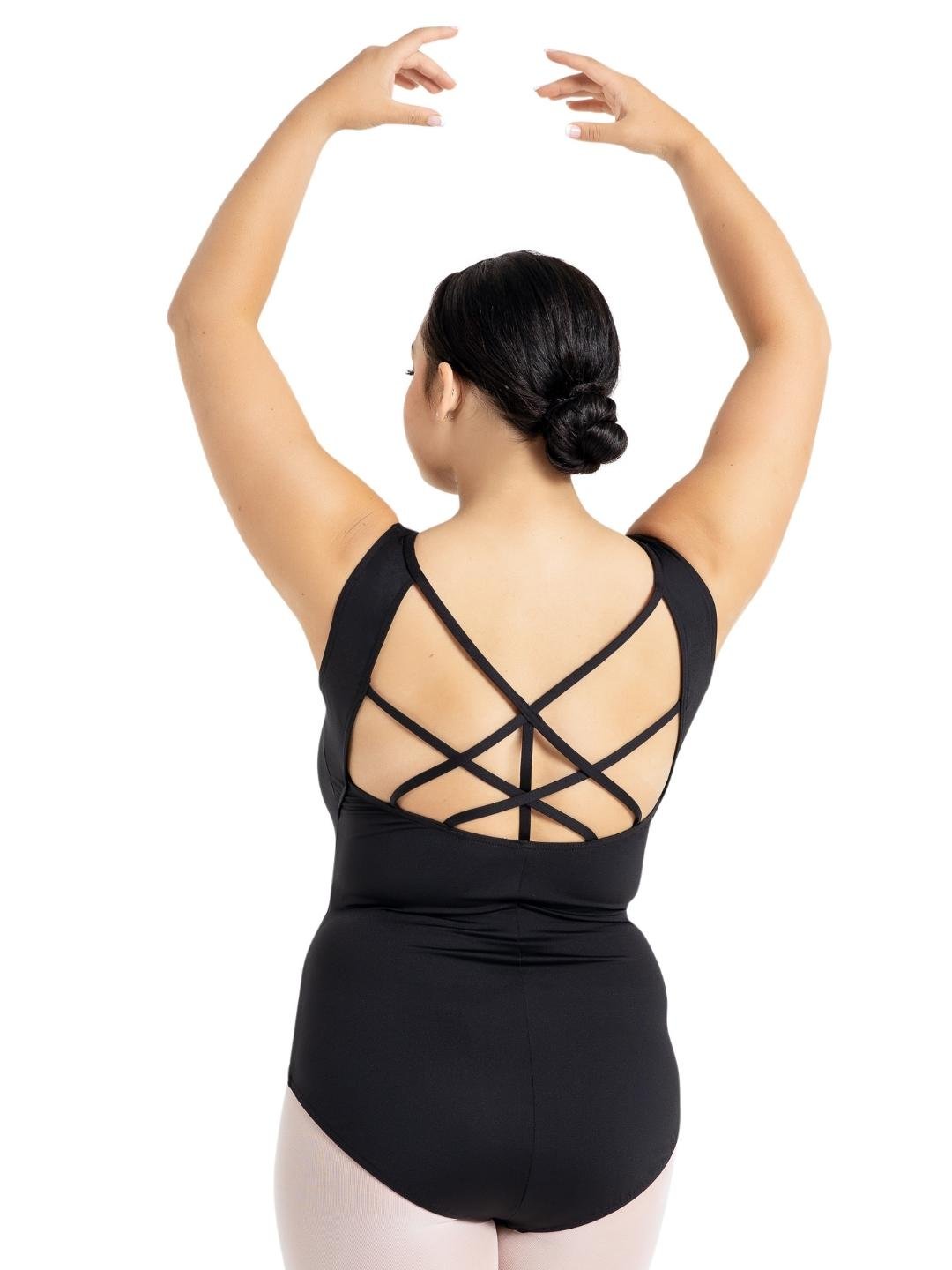 Person wearing a black leotard with criss-cross back design on a white background