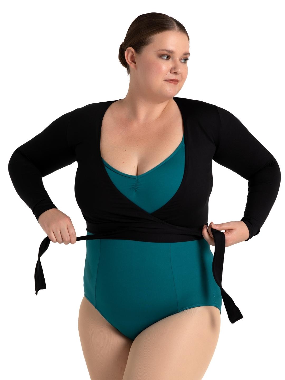 Woman wearing a teal swimsuit with a black cover-up on a white background