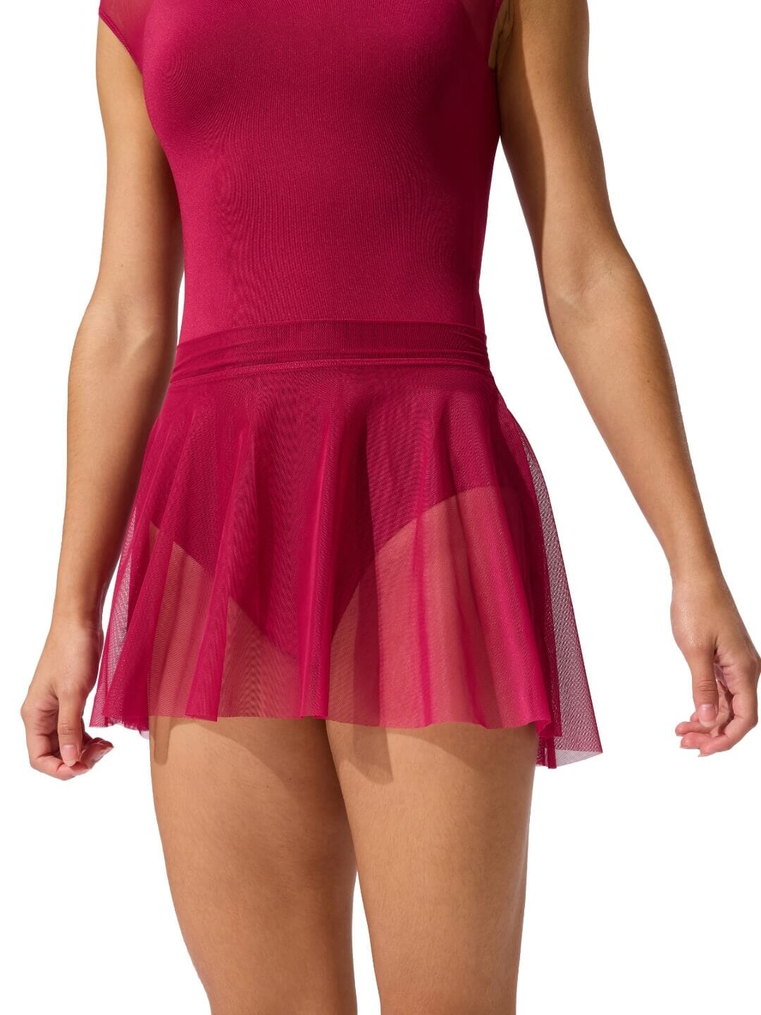 Pink dress with a sheer overlay on a white background