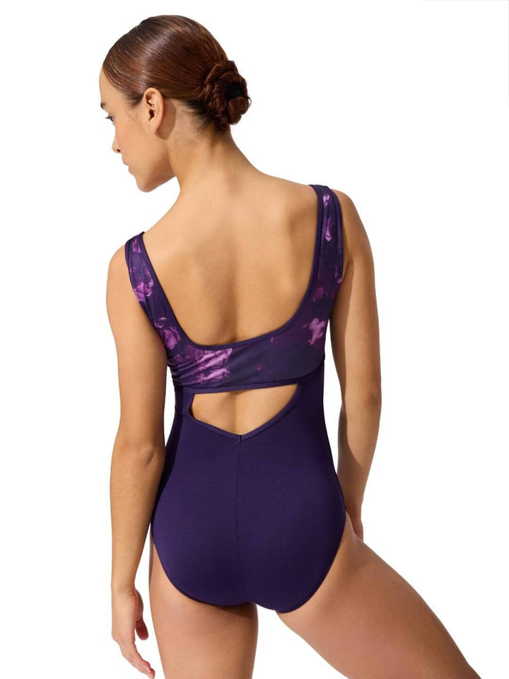 Purple swimsuit with cut-out design on a white background