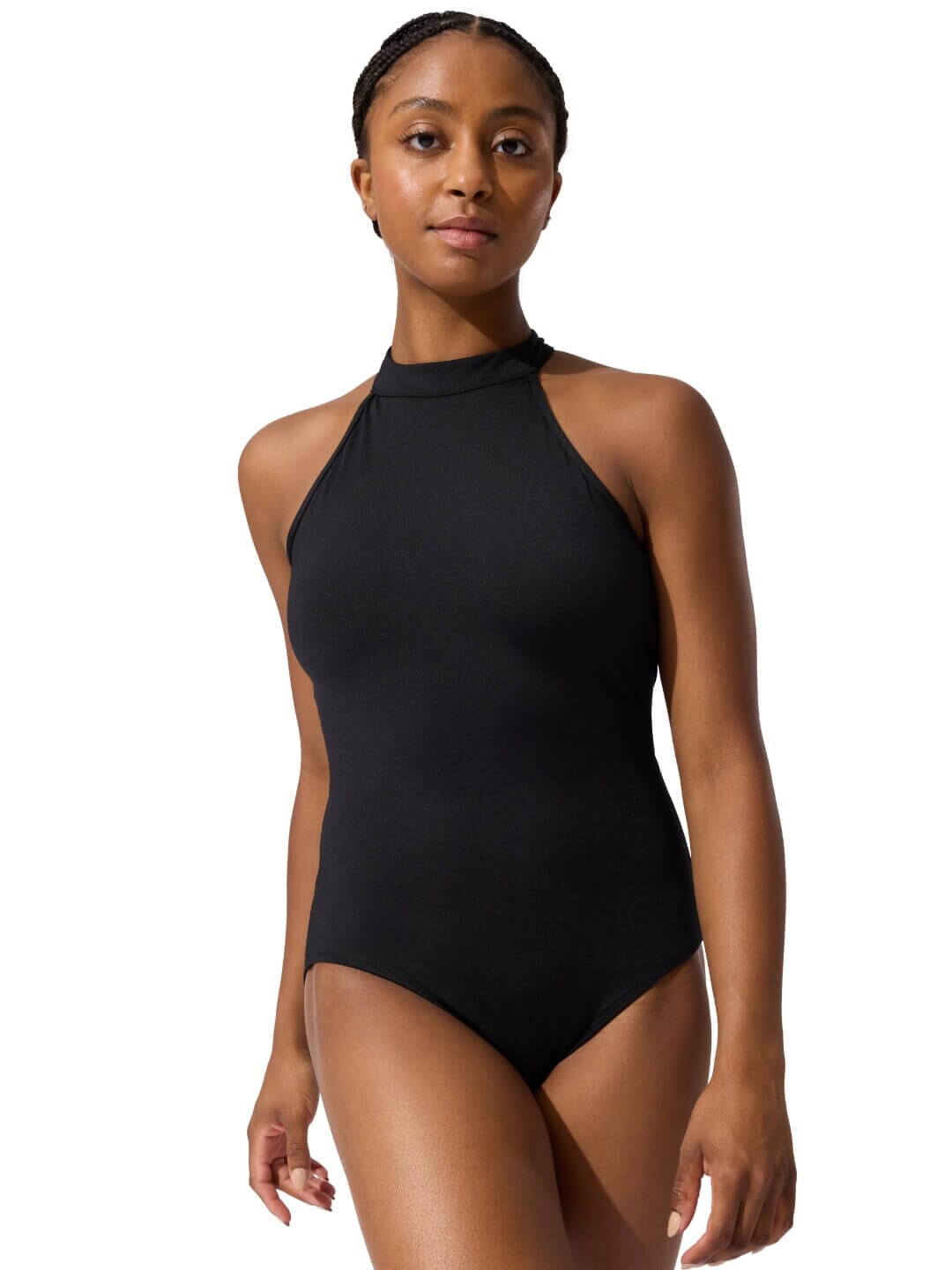 Woman wearing a black halter neck swimsuit on a white background