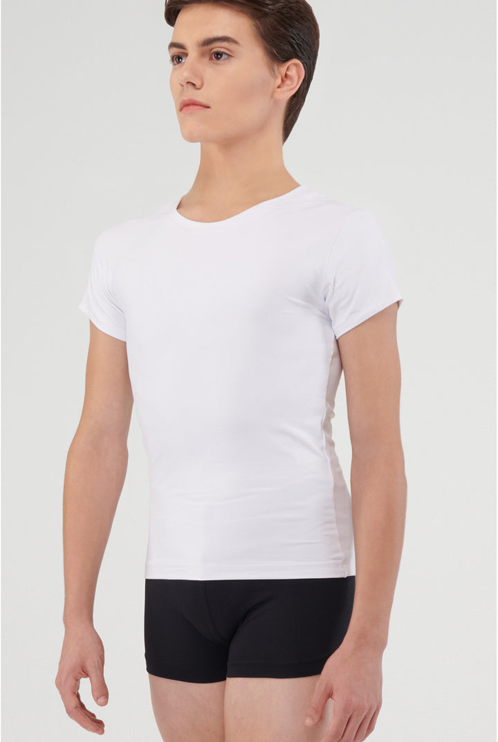 Person wearing a plain white t-shirt and black shorts on a light gray background