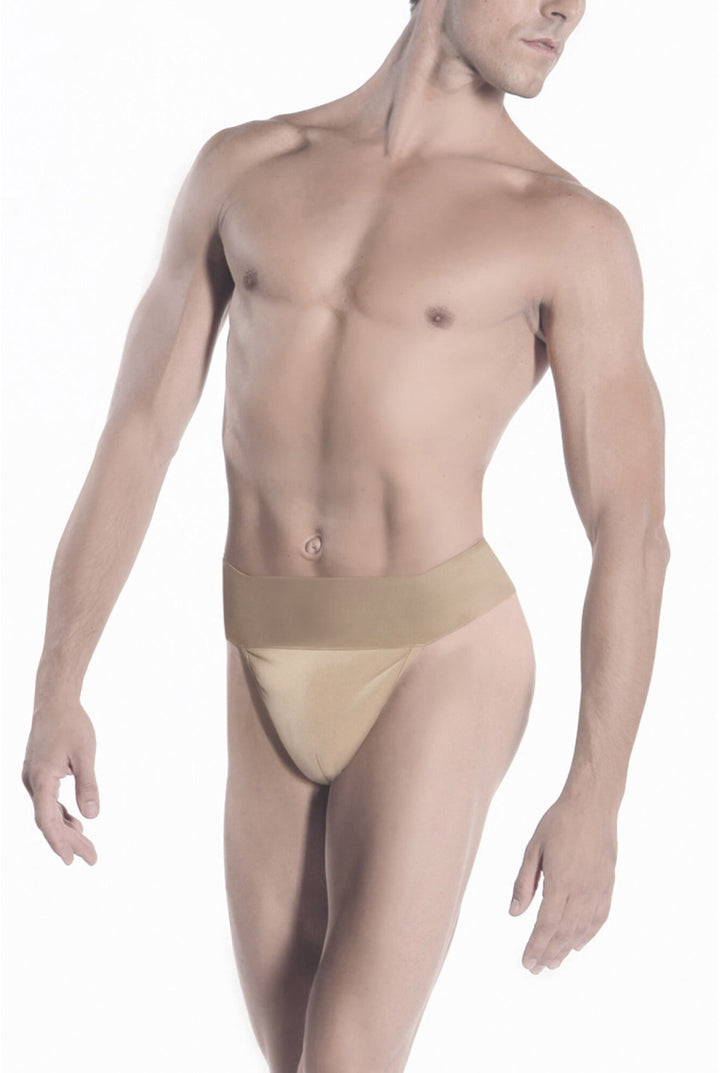 A male model wearing a beige high-waisted brief-style support garment, shown from head to upper thighs against a plain white studio background.