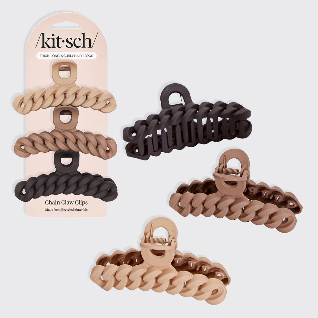 Kit'sch chain claw clips in beige, brown, and black on a white background