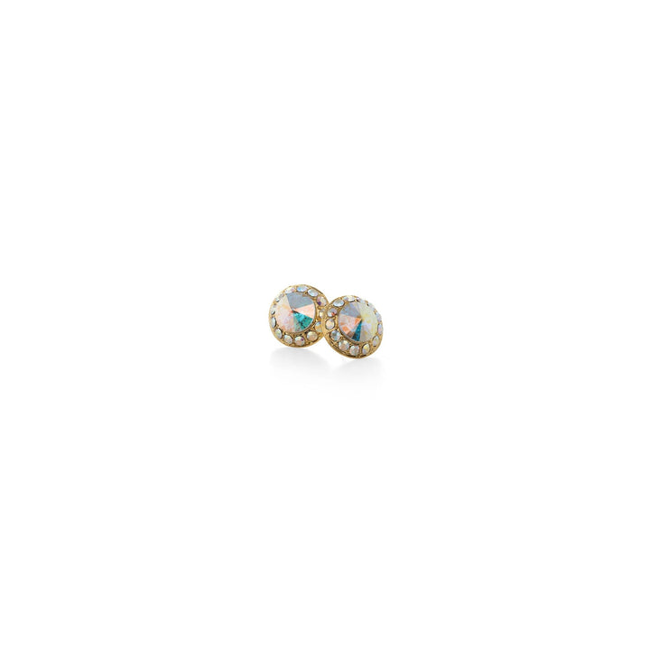 Pair of gold earrings with gemstones on a white background