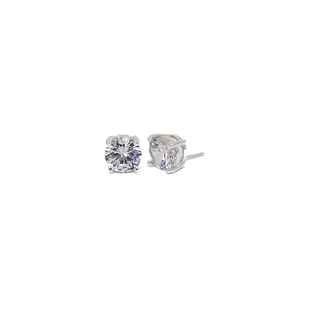 Pair of diamond stud earrings on a white background