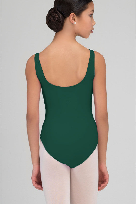 Person wearing a green leotard against a plain background