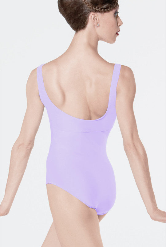 Person wearing a lavender leotard on a plain background