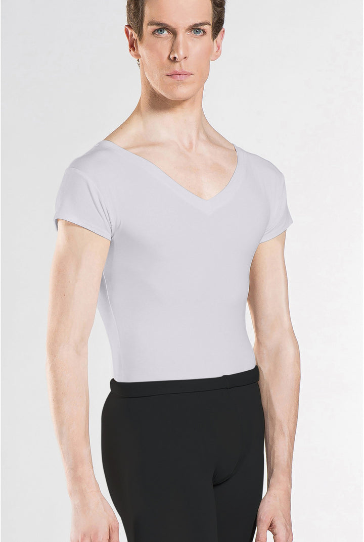 Person wearing a light gray short-sleeve top and black pants on a white background