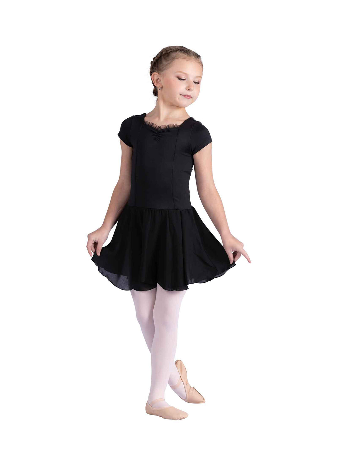 Young girl in a black ballet dress on a white background