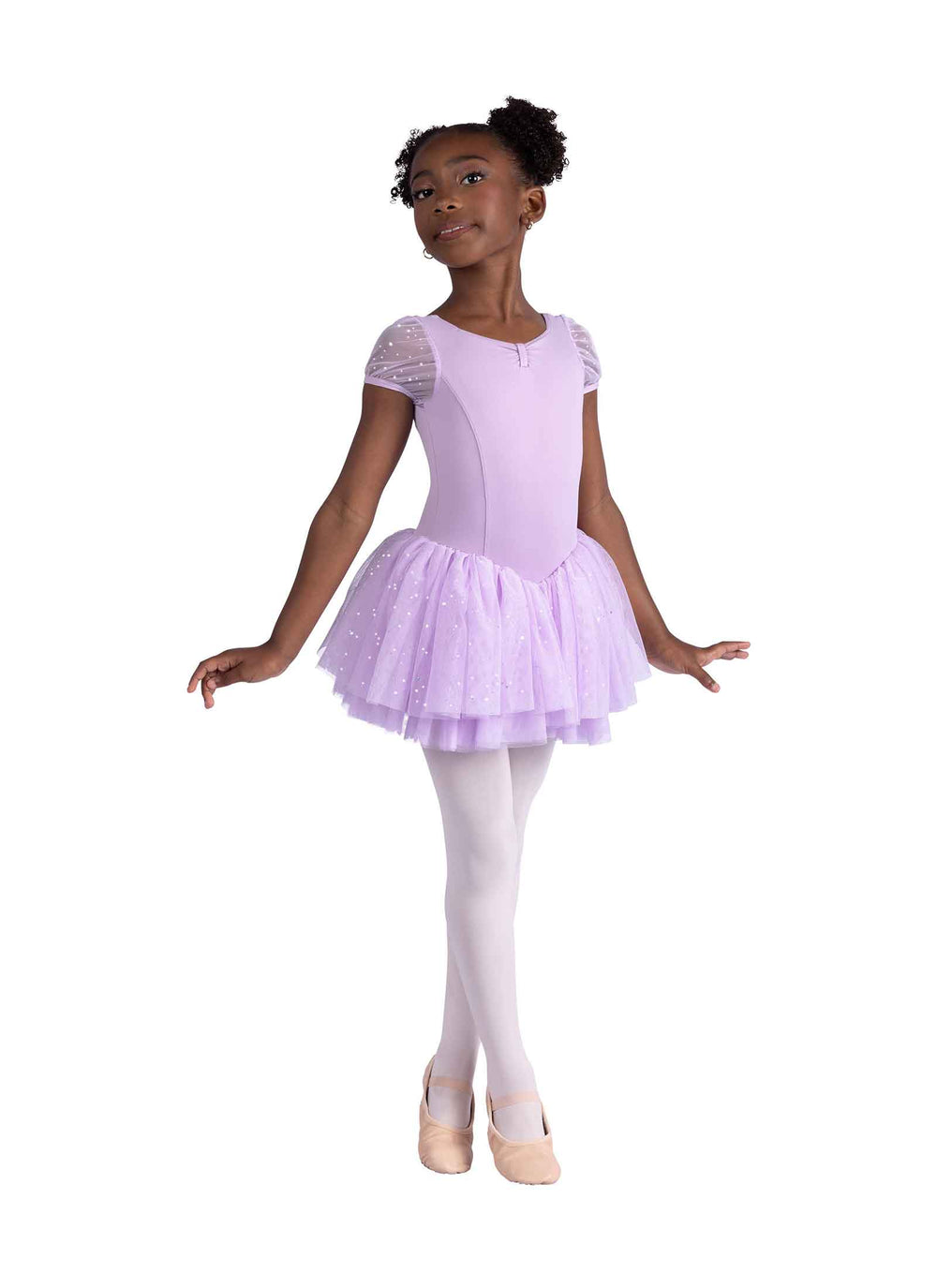 Young girl in a lavender ballet outfit on a white background