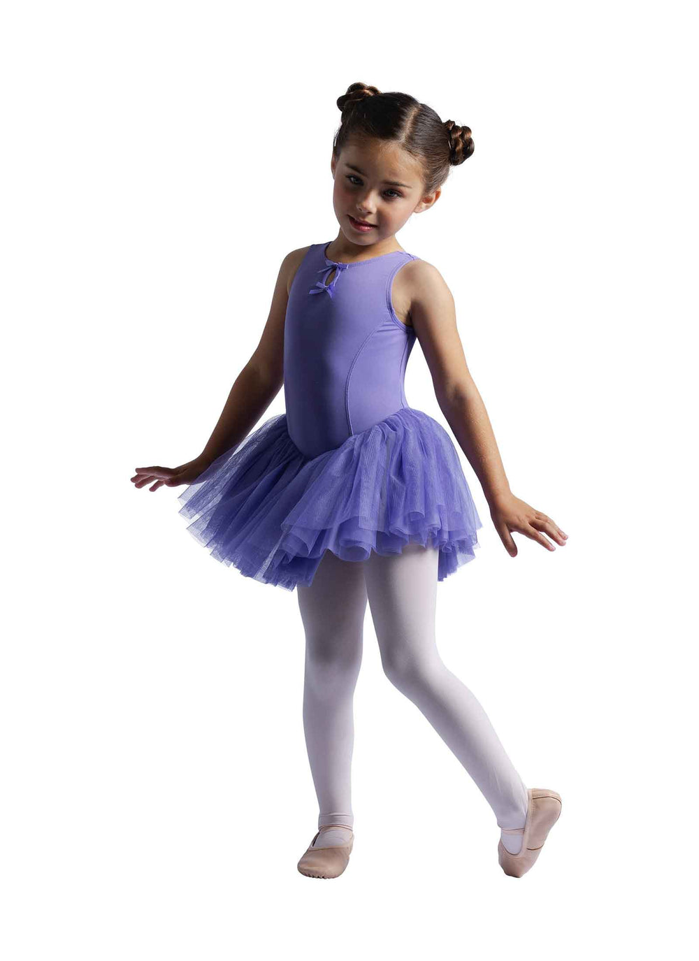 Young girl in a purple ballet dress posing on a white background