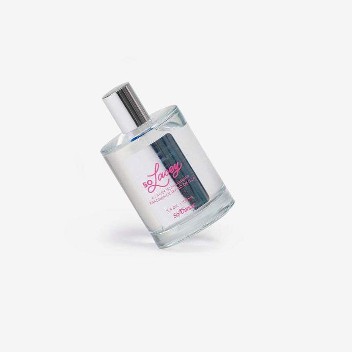 Perfume bottle with a silver cap on a white background