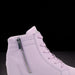 Lavender high-top sneaker with a zipper on a black background