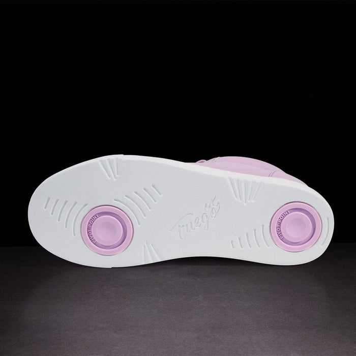 White sneaker with pink accents on a black background